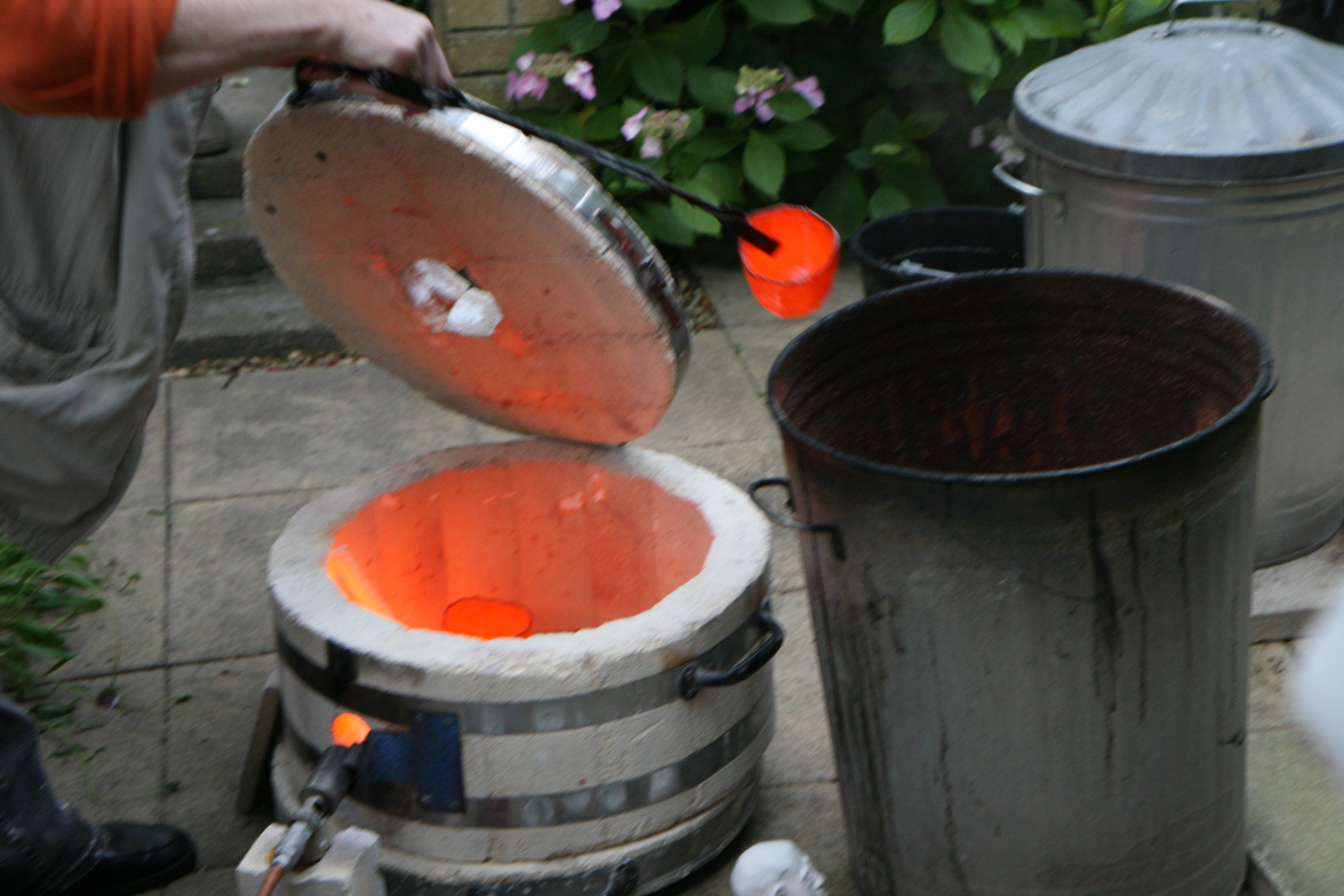 Raku Firing - removing pot when glowing hot