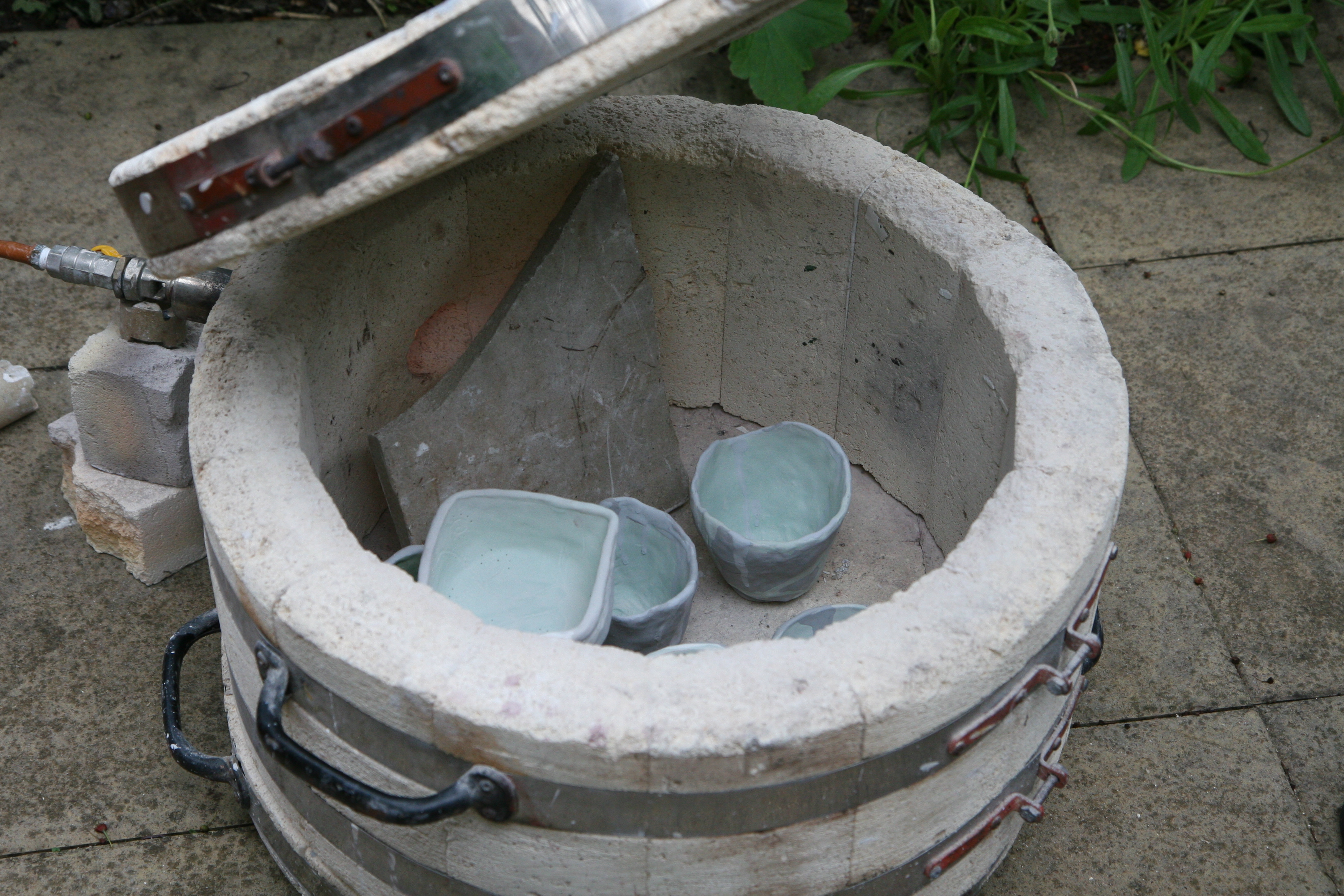 Setting up the Raku kiln - bisque fired glazed pots